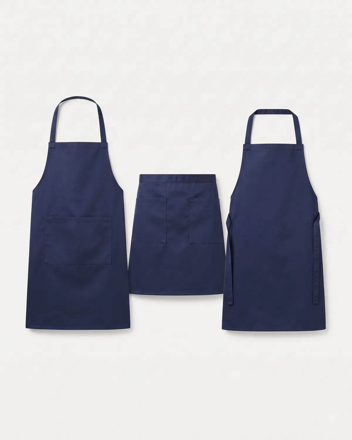 Aprons: bib, waist and cobbler, made by Uniform Corner