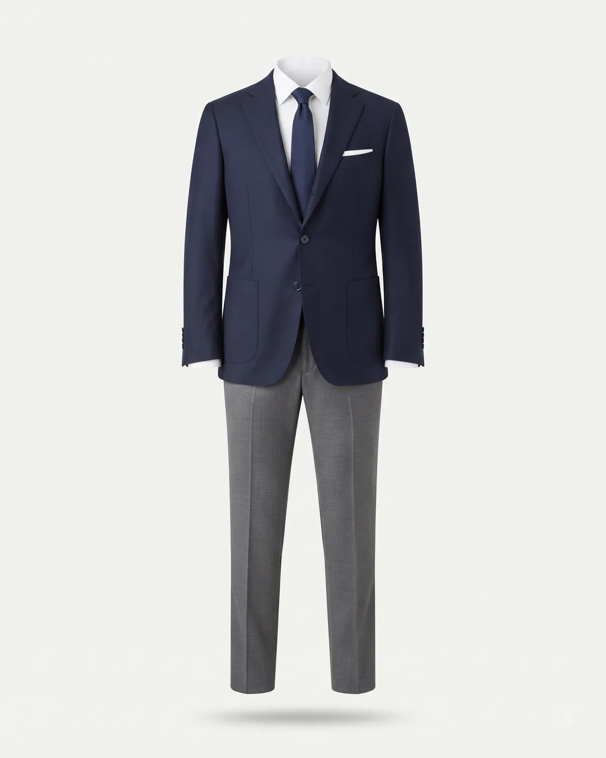 Blazer, trouser and tie, made by Uniform Corner